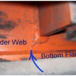 Figure 7‐5 This is a close‐up view of Figure 7‐4. The arrow points to the end of the crack. The crack is propagating toward the bottom flange of the girder. Cracks in the bottom flange of a girder can cause a catastrophic girder failure.