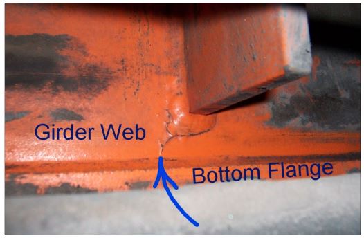 Figure 7‐5This is a close‐up view of Figure 7‐4. The arrow points to the end of the crack. The crack is propagating toward the bottom flange of the girder. Cracks in the bottom flange of a girder can cause a catastrophic girder failure.